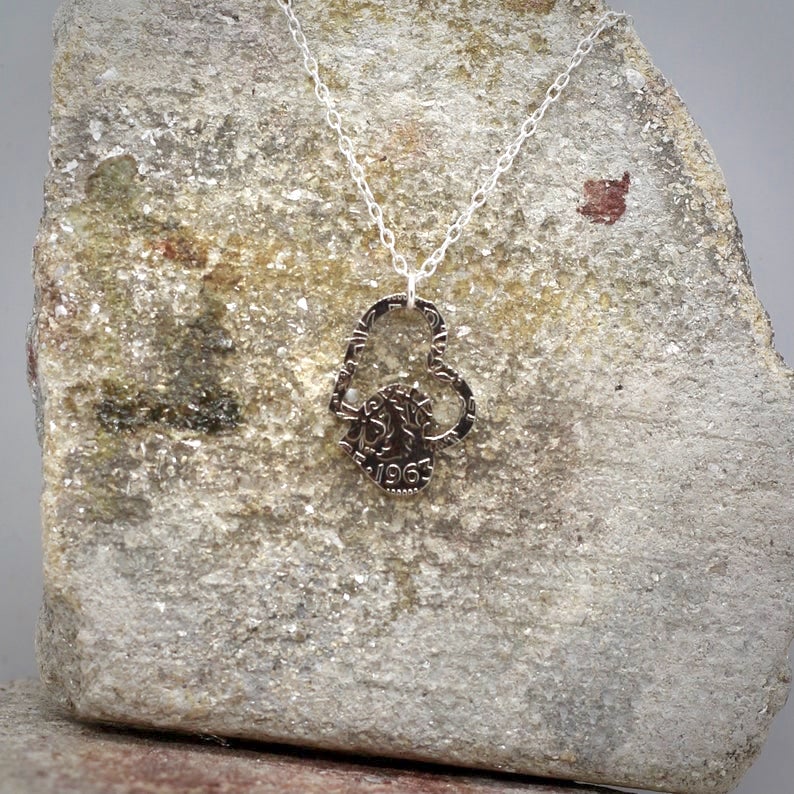 A lucky Sixpence 2 hearts Pendant.